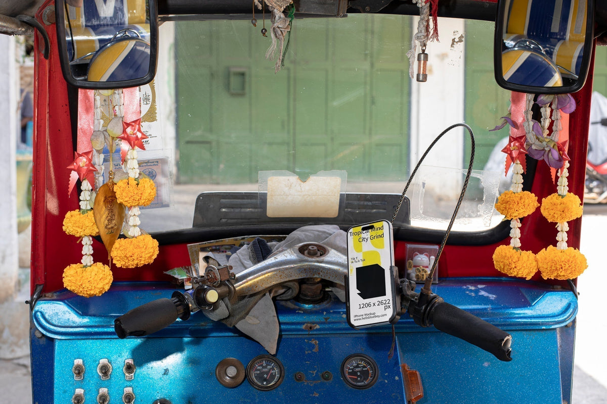 iPhone tacked inside a tuk tuk.