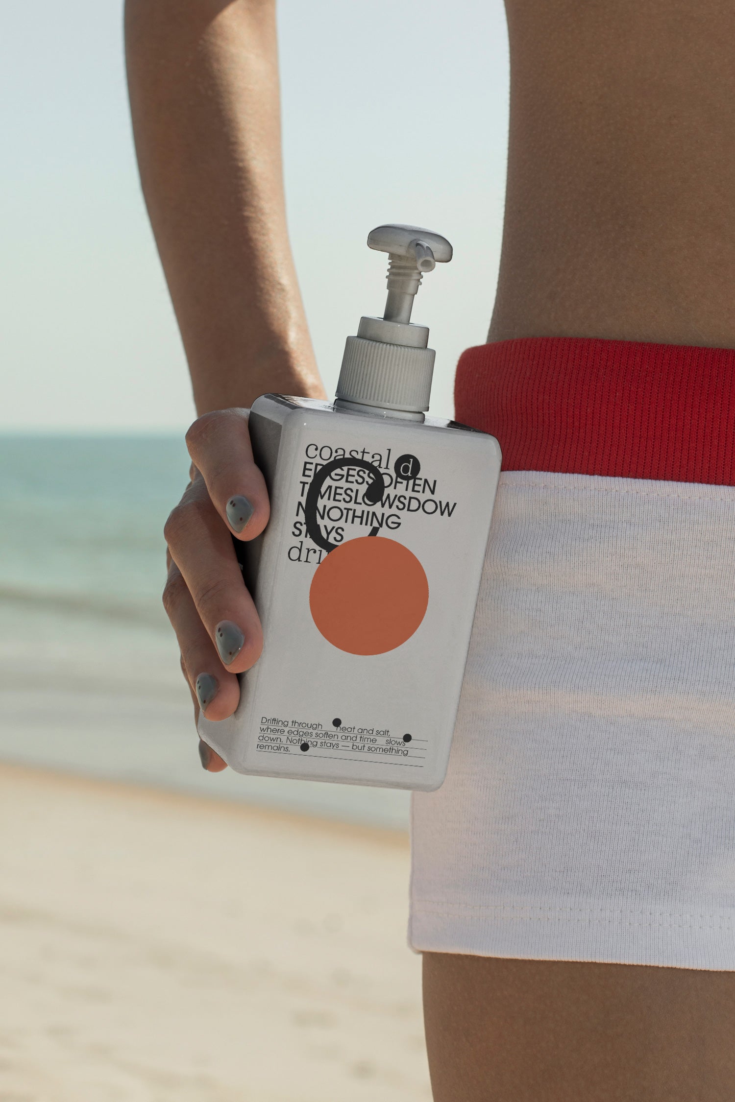 Sunscreen bottle mockup held by hand. Built for showcasing skincare brands, cosmetic packaging, wellness products, and outdoor lifestyle concepts.