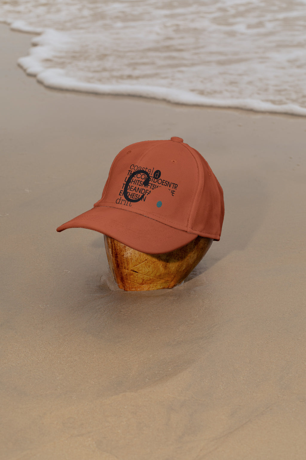 Cap mockup placed on a coconut at the beach in Hua Hin, Thailand. Built for showcasing fashion, lifestyle, branding, and editorial concepts.