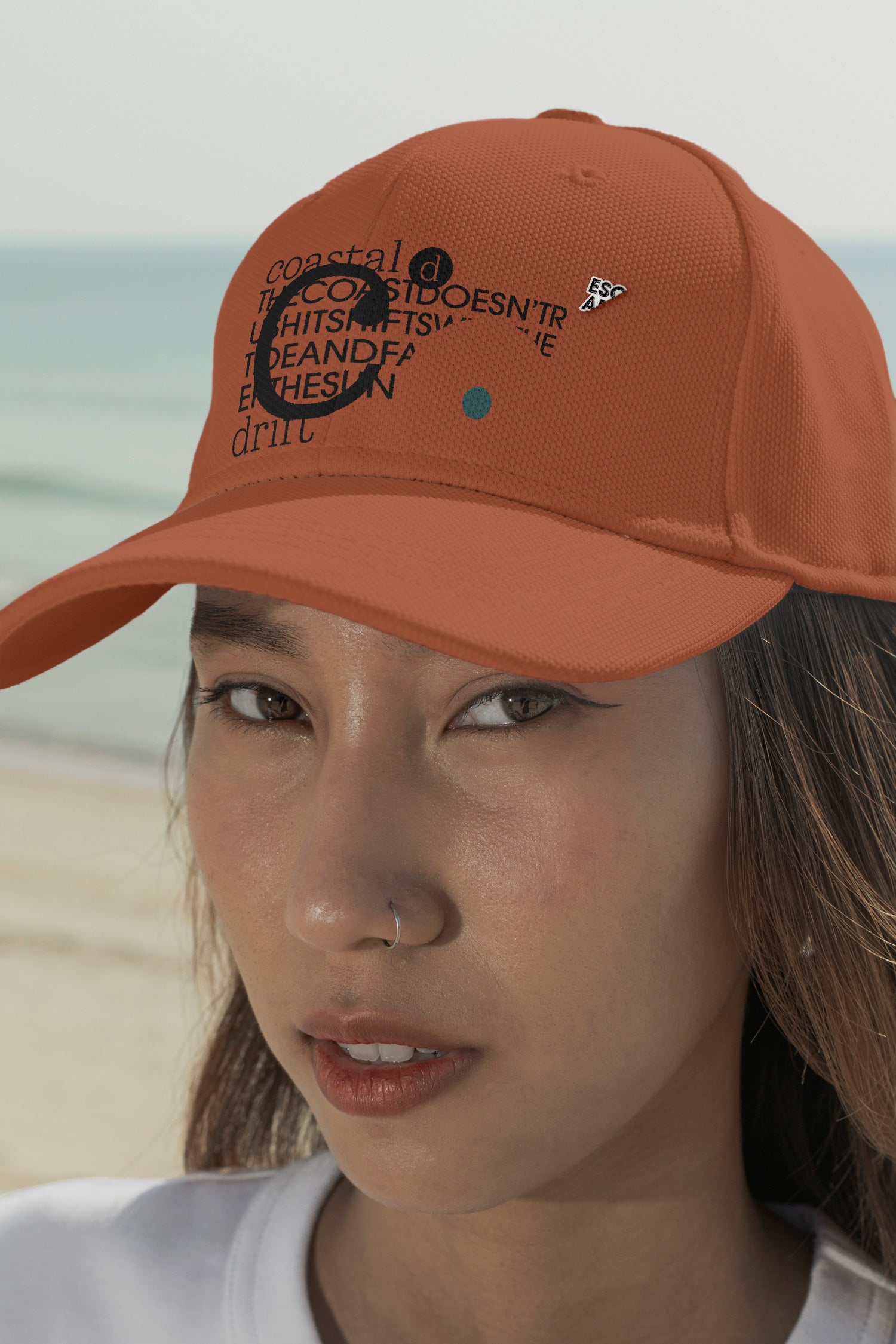Cap mockup. Features optional embroidery and a customizable lapel pin for more tactile and realistic brand presentations.
