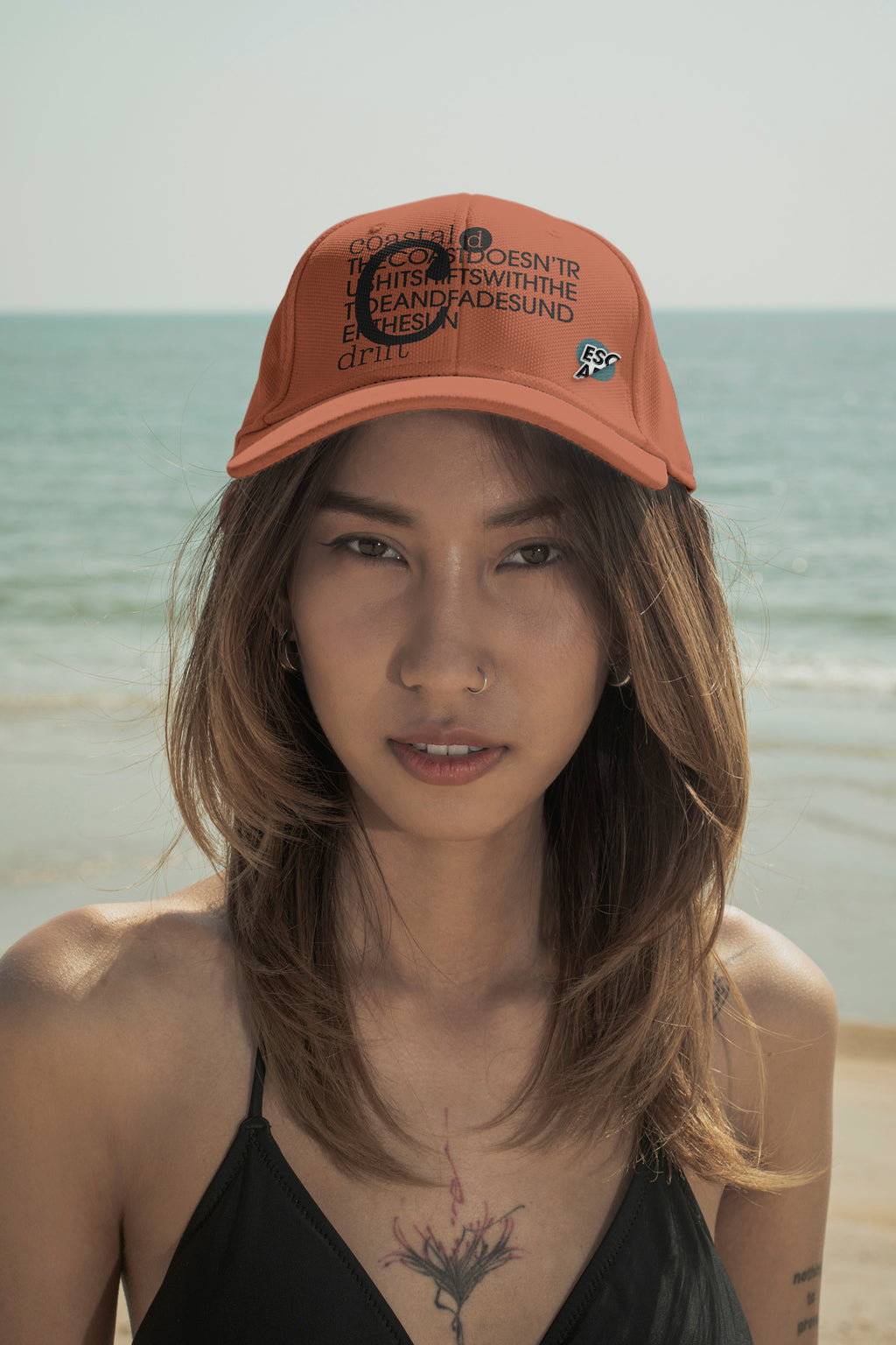 Cap mockup. Features optional embroidery and a customizable lapel pin for more tactile and realistic brand presentations.