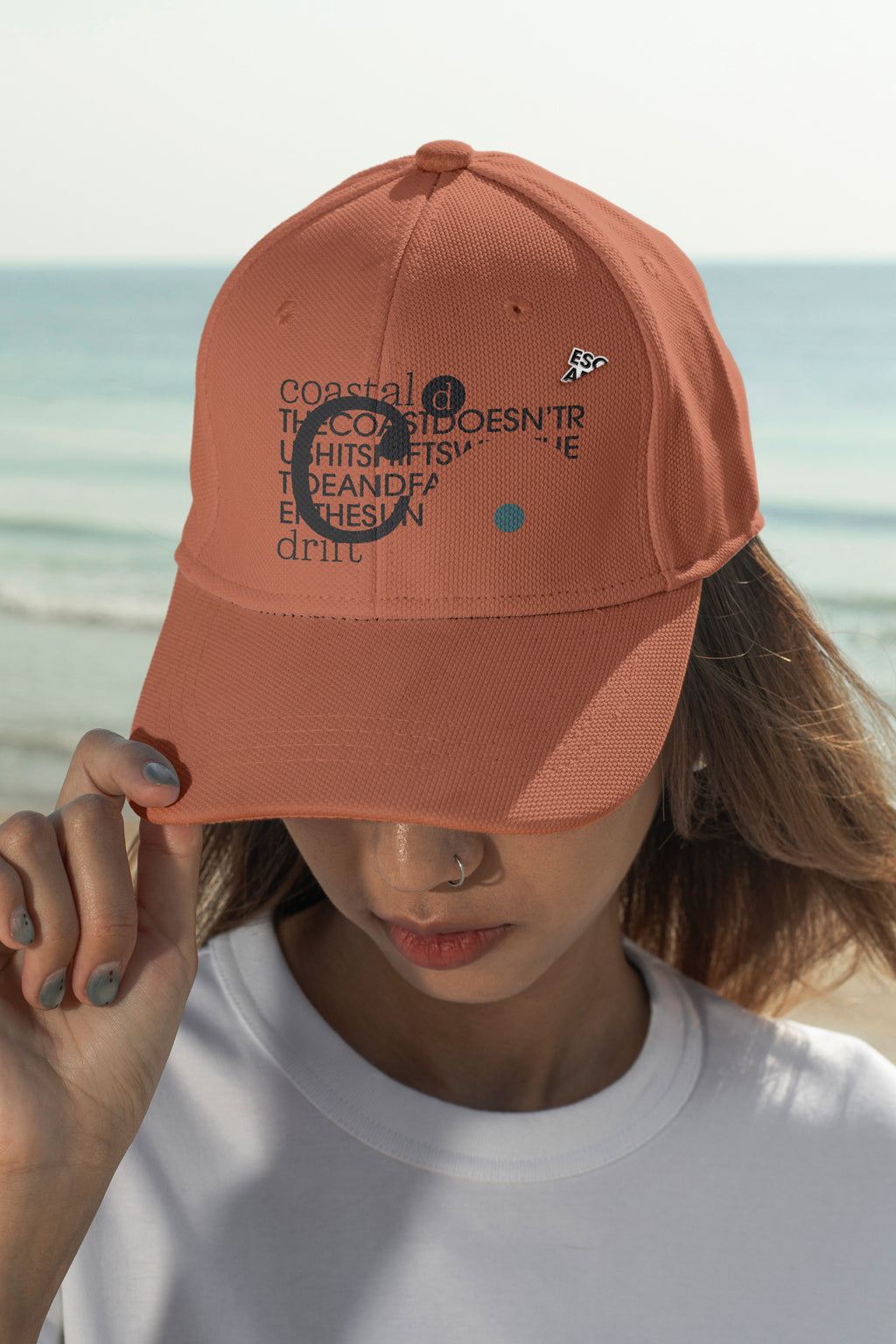 Cap mockup. Features optional embroidery and a customizable lapel pin for more tactile and realistic brand presentations.