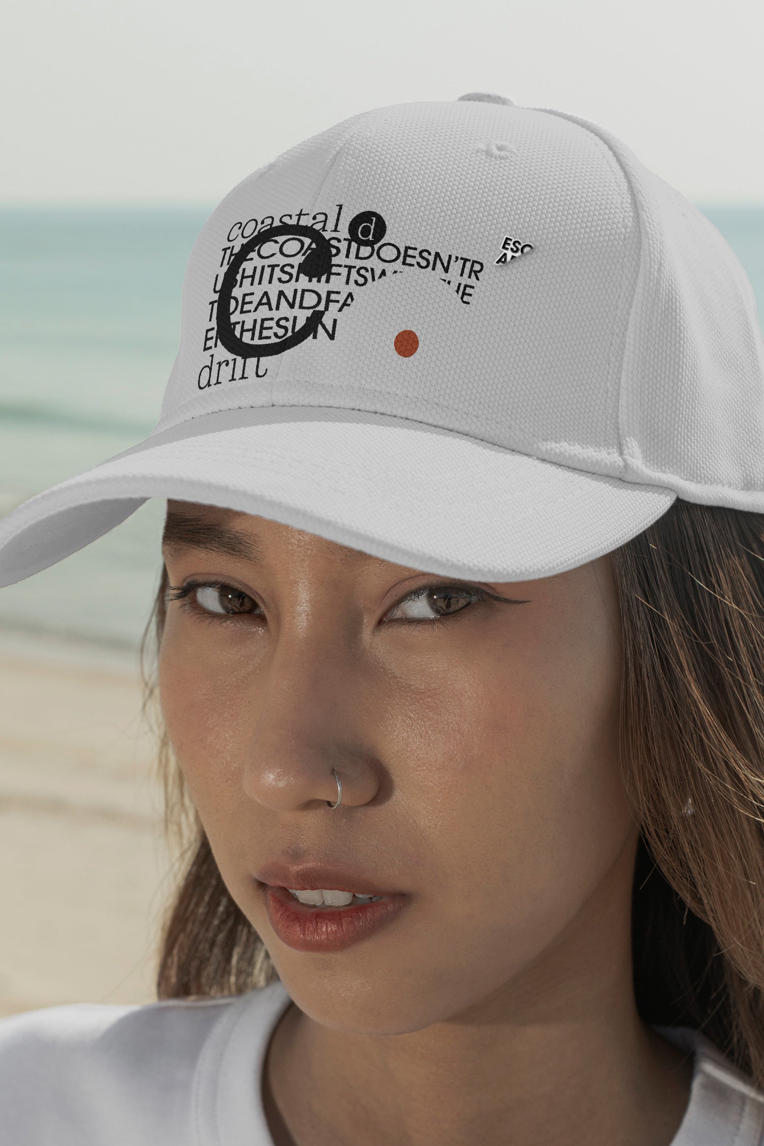 Cap mockup. Features optional embroidery and a customizable lapel pin for more tactile and realistic brand presentations.