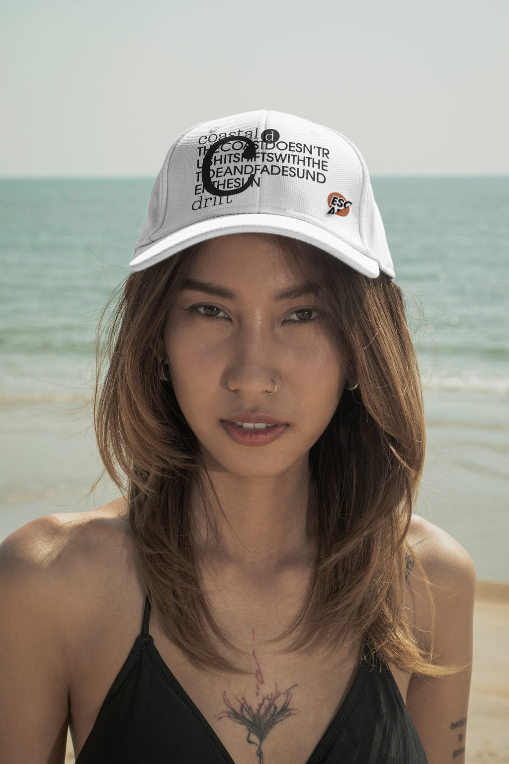 Cap mockup. Features optional embroidery and a customizable lapel pin for more tactile and realistic brand presentations.