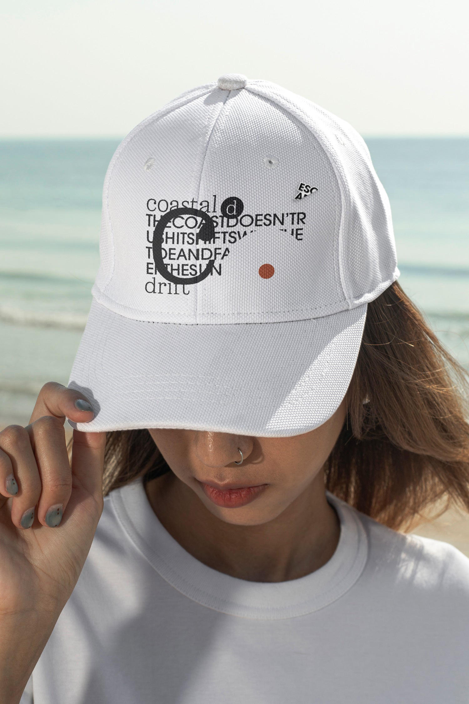 Cap mockup. Features optional embroidery and a customizable lapel pin for more tactile and realistic brand presentations.