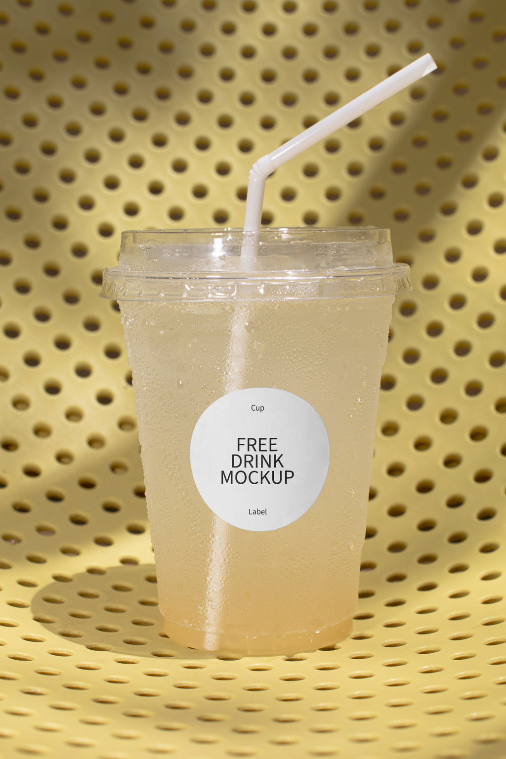 Takeaway drink mockup resting on a chair, featuring a customizable label. Built for showcasing beverage brands, packaging, cafés, restaurants, and lifestyle concepts.