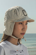 Aviation flap cap and T-shirt mockups worn by local creative Nae along the coast of Hua Hin, Thailand. Built for showcasing apparel brands, fashion collections, and lifestyle identities.