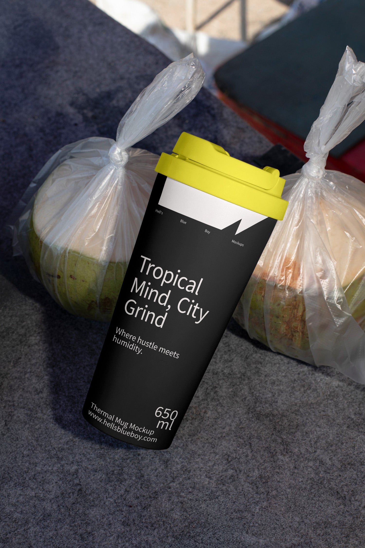 Thermal mug mockup with fresh packed coconuts in the background. Ideal for showcasing branding, logos, and beverage designs in a tropical setting.