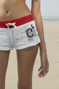 Shorts mockup worn at the beach in Hua Hin, Thailand. Features optional embroidery and a customizable lapel pin for more tactile and realistic apparel branding presentations.