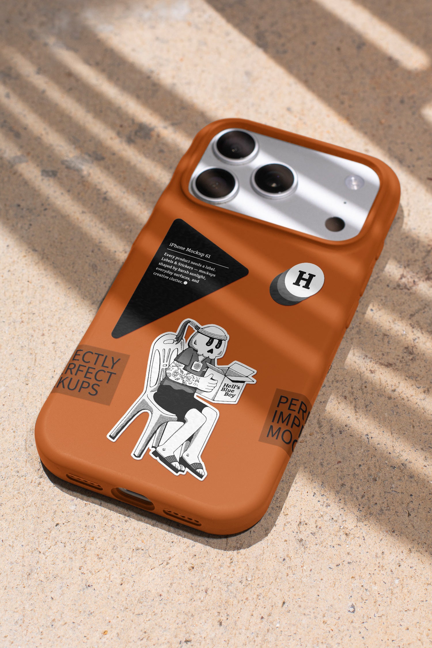 iPhone mockup captured in hard daylight, with labels and stickers applied directly to the case.
