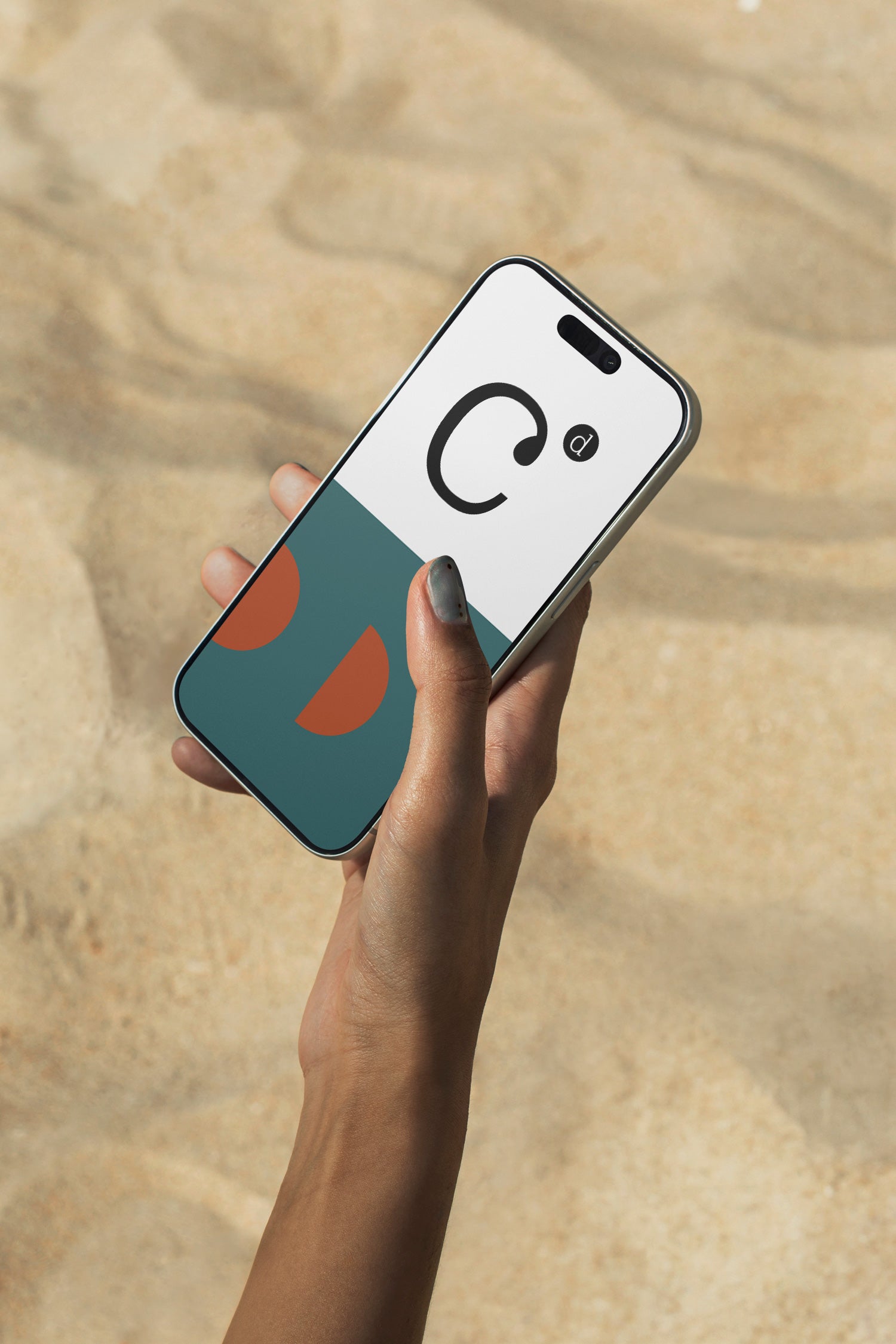 iPhone mockup held above rippling ocean water. Ideal for showcasing app interfaces, branding systems, social media visuals, and digital presentations.