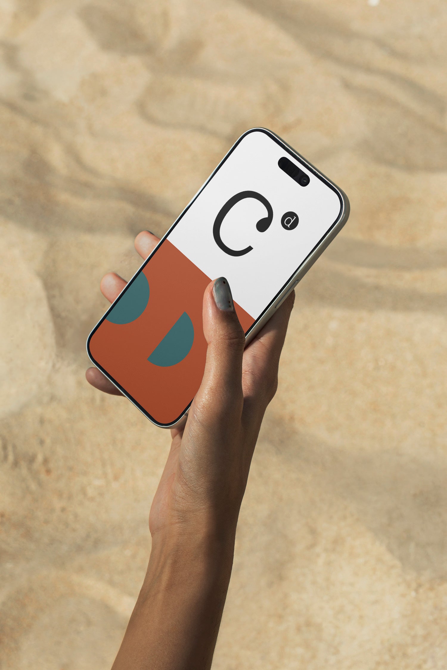 iPhone mockup held above rippling ocean water. Ideal for showcasing app interfaces, branding systems, social media visuals, and digital presentations.