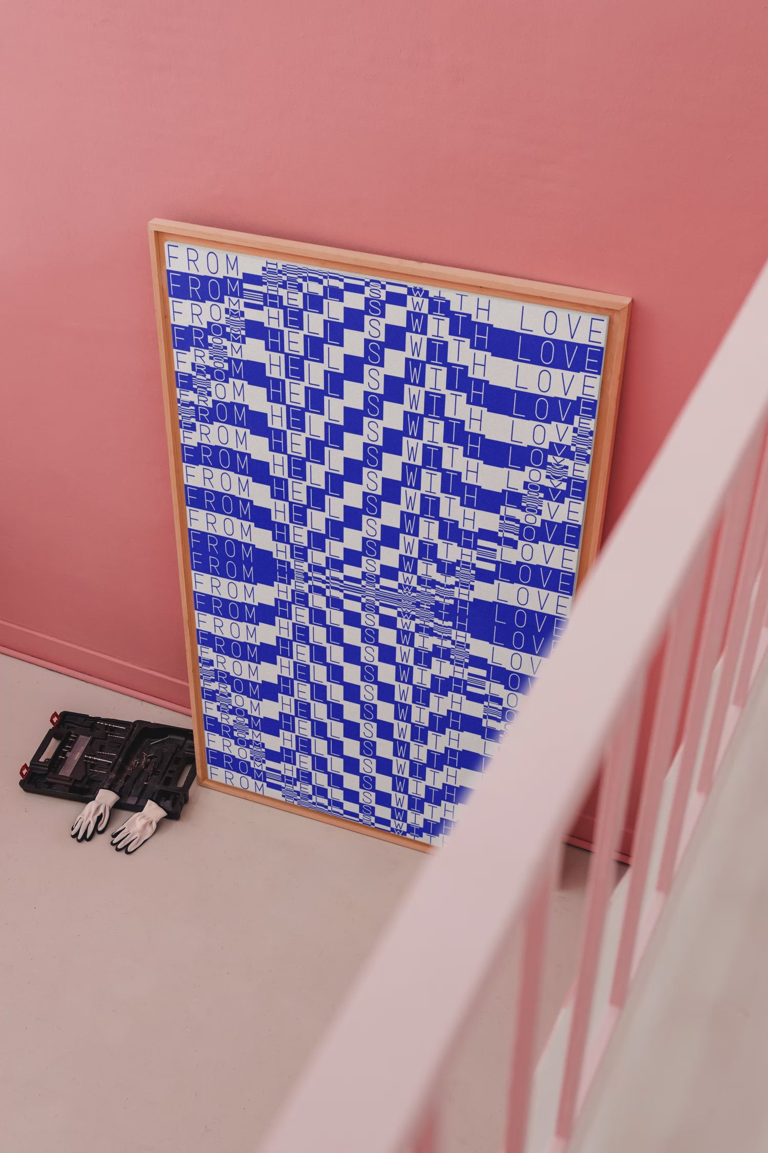 Large format canvas and poster mockup with a wooden frame, leaning against a wall and styled with a toolbox and gloves.